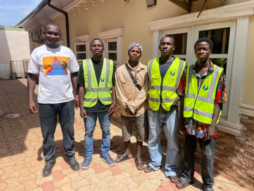 YTECH Engineering Services team of certified electricians and solar installers at a completed residential solar installation site